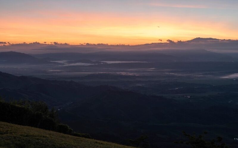 Serene mountain sunrise landscape